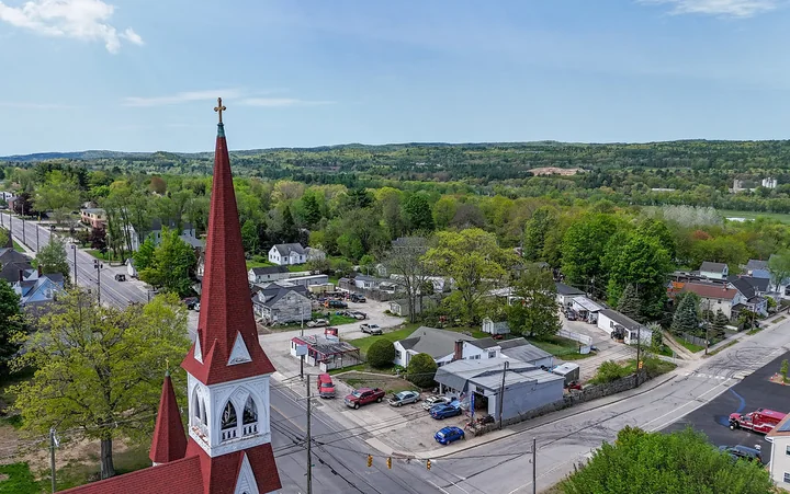 Aerial view of St. John the Baptist church and village streets in Allenstown, New Hampshire