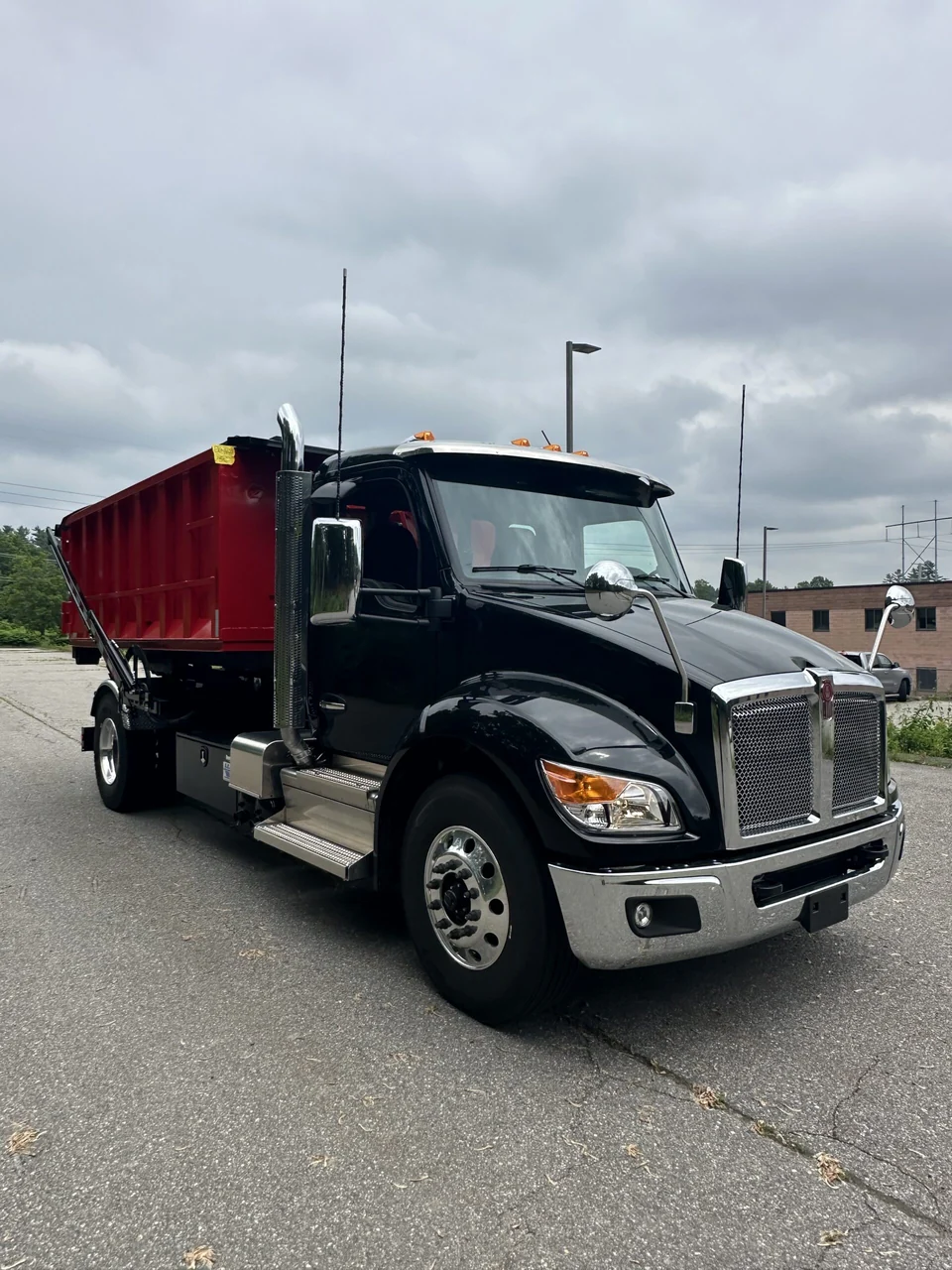 Arsenal Waste Management roll-off truck serving Merrimack NH - all-inclusive dumpster rental
