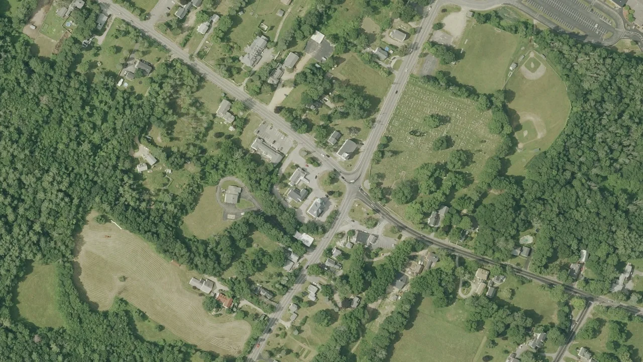 Aerial view of Chester’s historic village crossroads and surrounding homes, New Hampshire