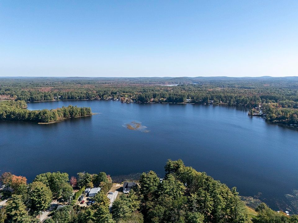 Aerial view of Great Pond and its wooded shoreline in Kingston, New Hampshire