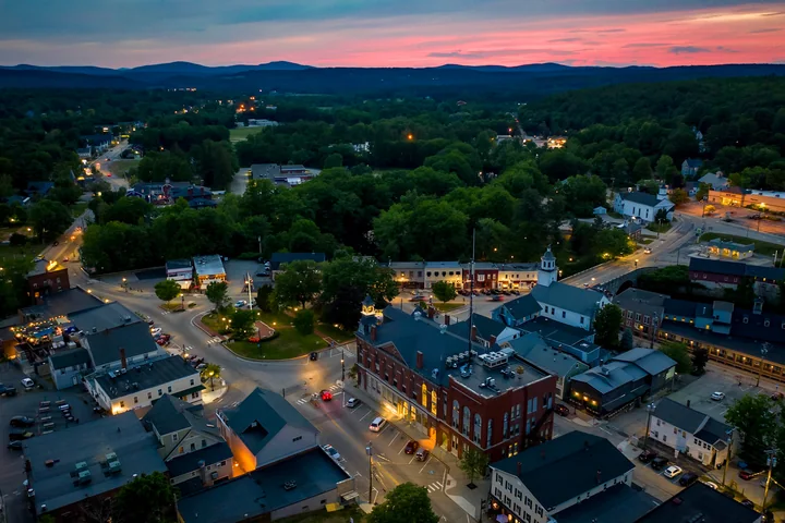 Sunset aerial view of Milford Oval and downtown Milford, New Hampshire