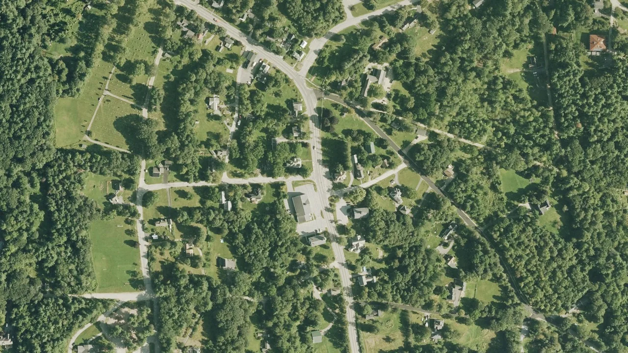 Aerial view of Mont Vernon’s historic Main Street village and surrounding trees, New Hampshire